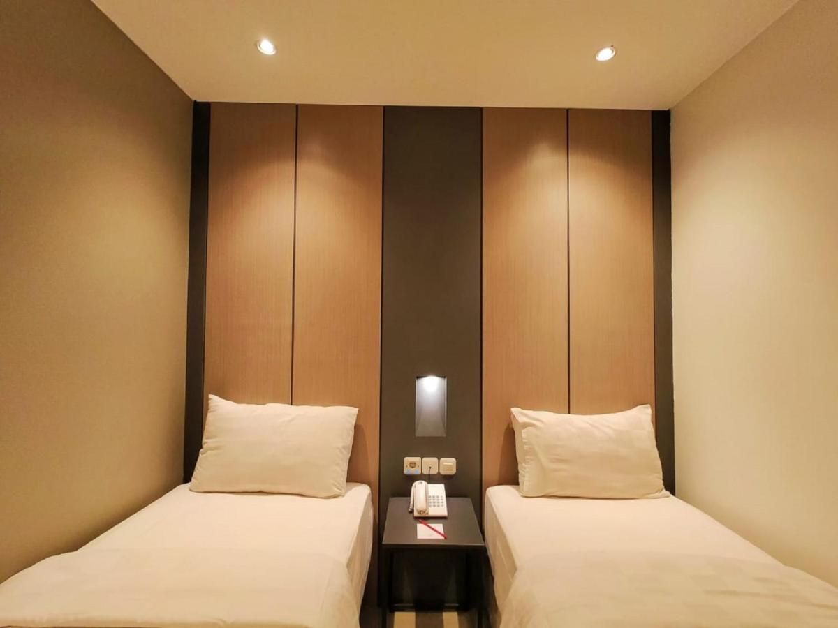 Quarto com 2 Camas de Solteiro